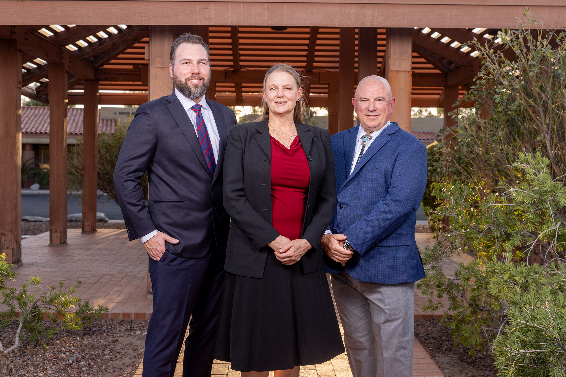 Doctors Atkinson, Gustafson, and Schilling standing outside.